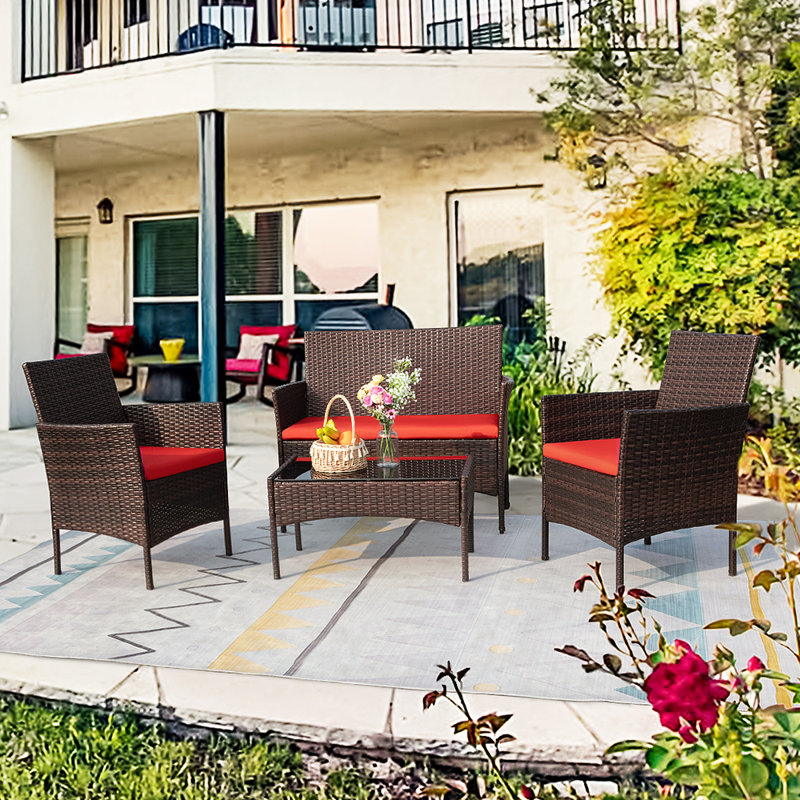 Brayden Studio Donn 4 Piece Rattan Sofa Seating Group with Cushions Reviews Wayfair